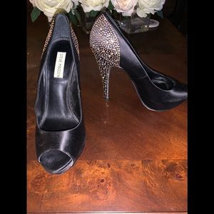 Black satin pumps by Steve Madden size 10